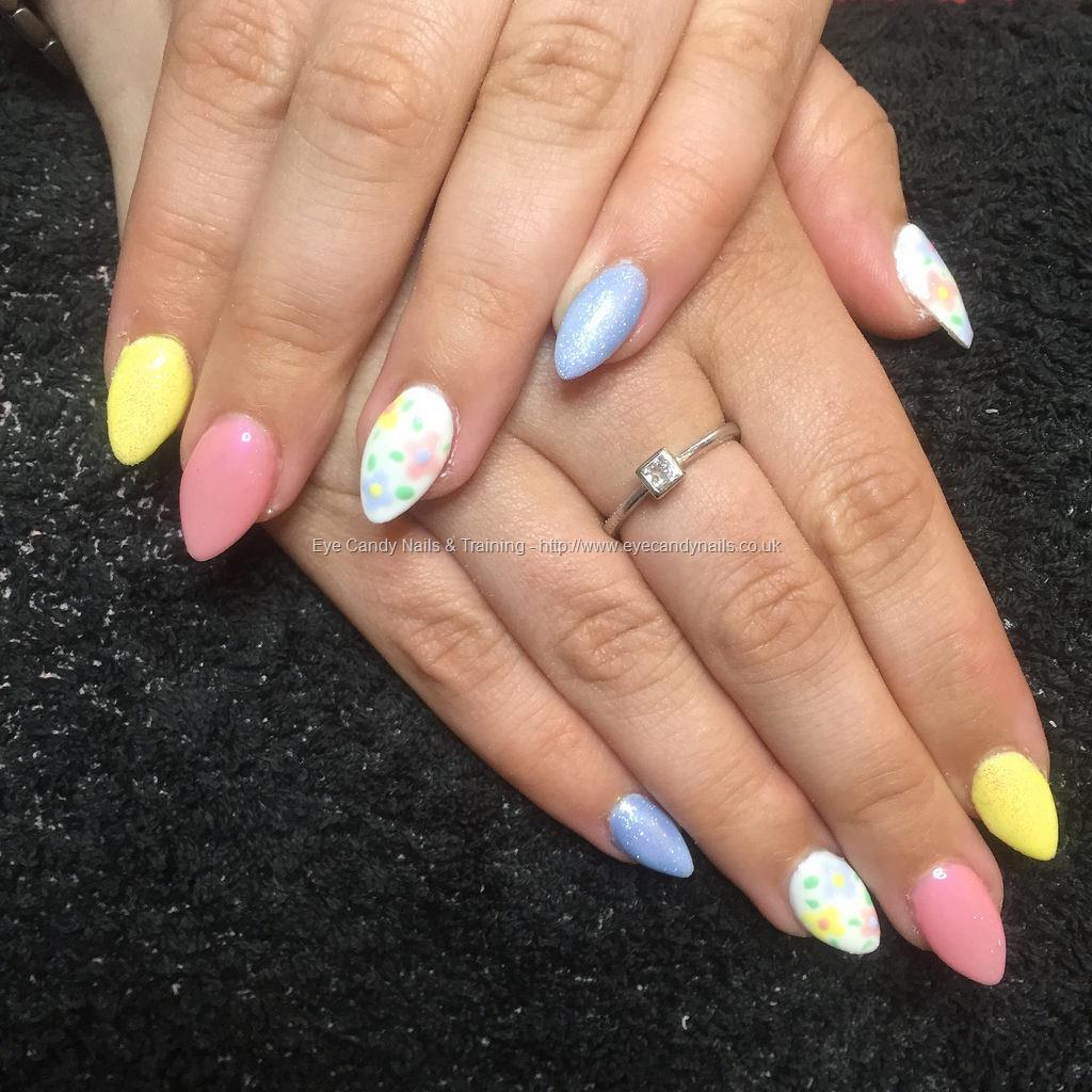 Dev Guy - Almond Acrylics With Pastel Pink, Yellow And Blue Gel Polishes  And Nail Art Flowers On Ring Fingers And Thumbs. Nail Technician:Amy  Mitchell on 15 June 2016 at 13:55